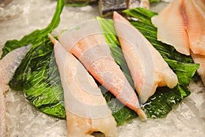 Raw fish meat on ice seamarket