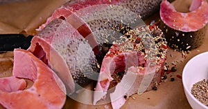 raw fish with red meat during cooking