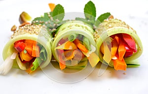 Raw food recipe with cucumber, pepper, onion and carrot