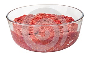 Raw forcemeat in glass bowl isolated on white