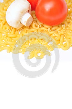 Raw fresh and healthy macaroni pasta and organic tomatoes mushroom