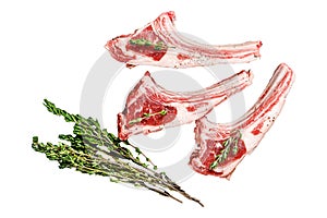 Raw fresh lamb ribs with pepper and rosemary. Organic meat. Isolated on white background. Top view.