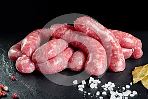 Raw and fresh meat. Fresh sausages and chicken meat ready to cook
