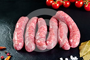 Raw and fresh meat. Fresh sausages and chicken meat ready to cook.