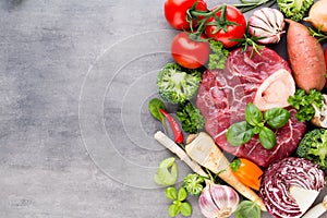 Raw fresh meat Ribeye Steak with vegetables and spice