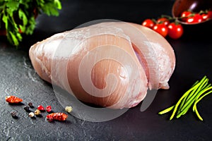 Raw and fresh meat. Whole chicken breast uncooked and uncut