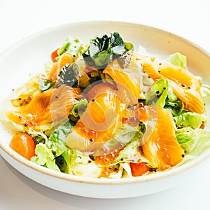 Raw fresh salmon meat sashimi with vegetable salad