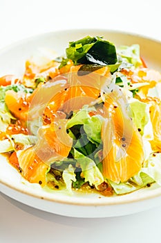 Raw fresh salmon meat sashimi with vegetable salad