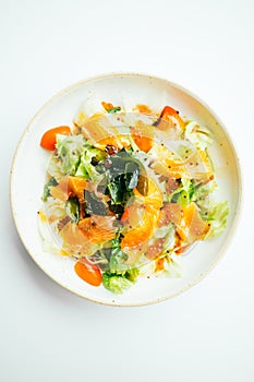 Raw fresh salmon meat sashimi with vegetable salad