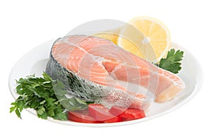 Raw fresh salmon steaks red fish on a plate
