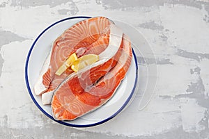 Raw fresh salmon trout and salmon on dish