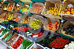 Raw fresh vegetables and fruits assortment on counter