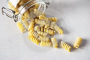 Raw Fusili Pasta Glass Jar Gray Background Horizontal Italian Food