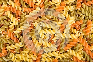 Raw fusilli pasta - three colors