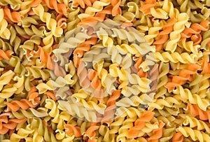 Raw fusilli pasta - three colors