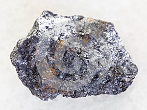 raw galena stone with chalcopyrite vein on white