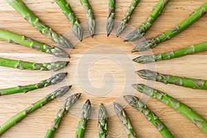 Raw garden asparagus stems. Fresh green spring vegetables