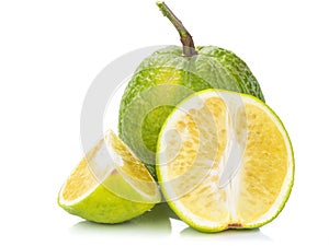 Raw green fruit, madarin citus on white background
