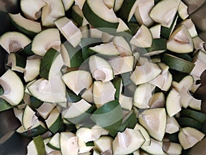Raw green mango cut pieces for making pickles