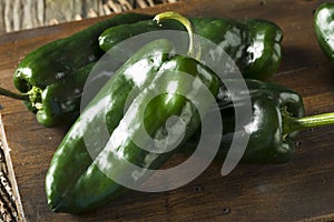 Raw Green Organic Poblano Peppers photo