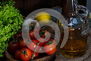 Raw green and red vegetables on rustic wood