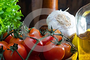 Raw green and red vegetables on rustic wood
