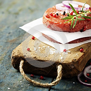 Raw Ground beef meat Burger steak cutlets with seasoning