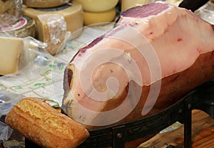raw ham for sale in the deli shop in Italy
