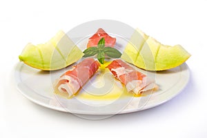 Raw ham and yellow melon