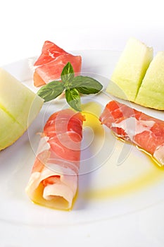 Raw ham and yellow melon