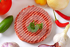 Raw hamburger patty