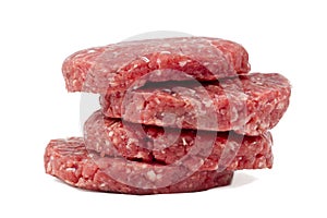 Raw hamburgers with transparent protective film