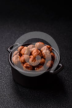 Raw hazelnuts without shells in a bowl