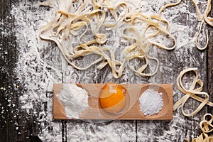 Raw homemade pasta with with egg yolk