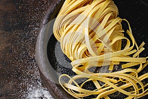 Raw homemade pasta tagliatelle