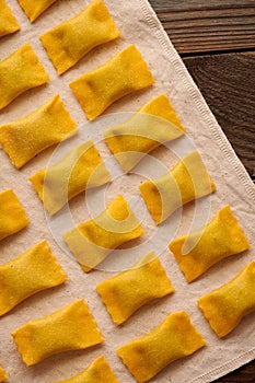 Raw homemade ravioli pasta with spinach and ricotta