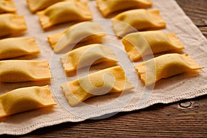 Raw homemade ravioli pasta with spinach and ricotta