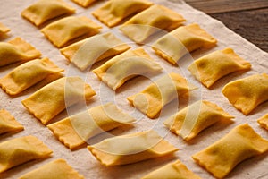 Raw homemade ravioli pasta with spinach and ricotta