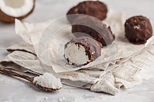 Raw homemade vegan chocolate coconut candy bounty, white backgro