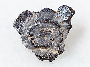 raw Ilmenite stone on white photo
