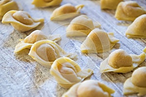 Raw italian cappelletti, fresh homemade pasta