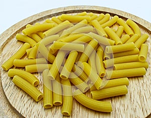 Raw italian Sedani Rigati. Italian maccheroni pasta specialty.