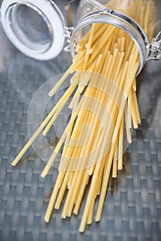Raw italian spaghetti in jar