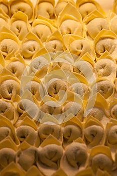 Raw italian tortellini, fresh homemade pasta photo