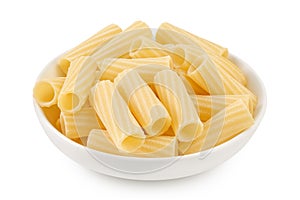 raw italian tortiglioni pasta in ceramic bowl isolated on white background with full depth of field