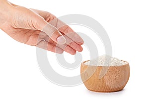 Raw Jasmine rice in hand isolated on white background