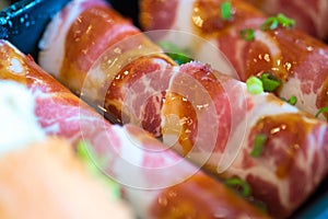 Raw kurobuta pork slices on plates, for sukoyaki and yakiniku ho