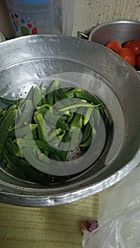 close up of raw ladyfinger in kitchen