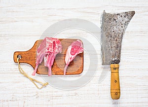 Raw Lamb Chops with Meat Cleaver
