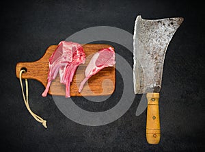 Raw Lamb Chops with Meat Cleaver